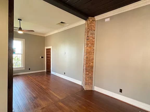 Main living and dining zone from a sample home before virtual staging